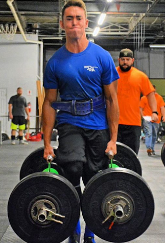 Benson is lifting  400lbs while doing the  farmers walk, during an event he took second in.
