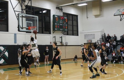 Senior, Dominic Waller throws up a floating lay up in the opening minutes of the Jan. 8 home game against Lafayette.