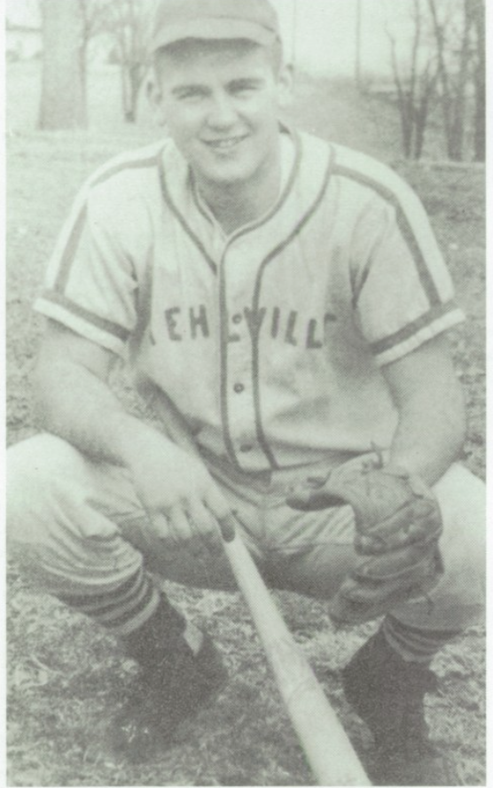 Once Superintendent of Mehlville High School, Bob Rogers, poses for a pitcher for the 1959 Mehlville Reflector yearbook. Rogers played catcher for the baseball team from 1956 to 1959.