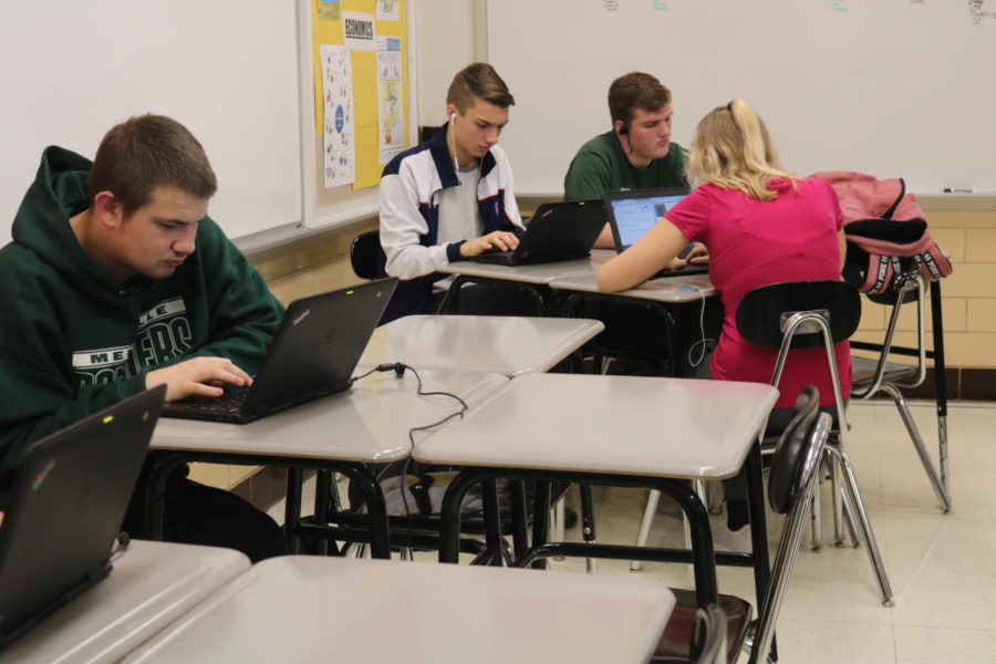 Students in Scott Vougas World History class engage in class work. 