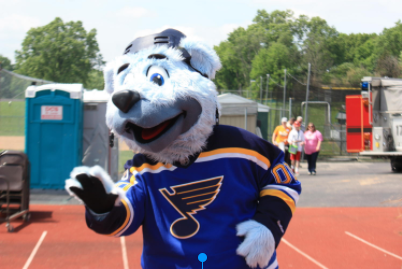 Athletes experience exiting moments including meeting St. Louis Blues mascot Louie at the 2017 Special Olympics held at the Jack Jordan Stadium.