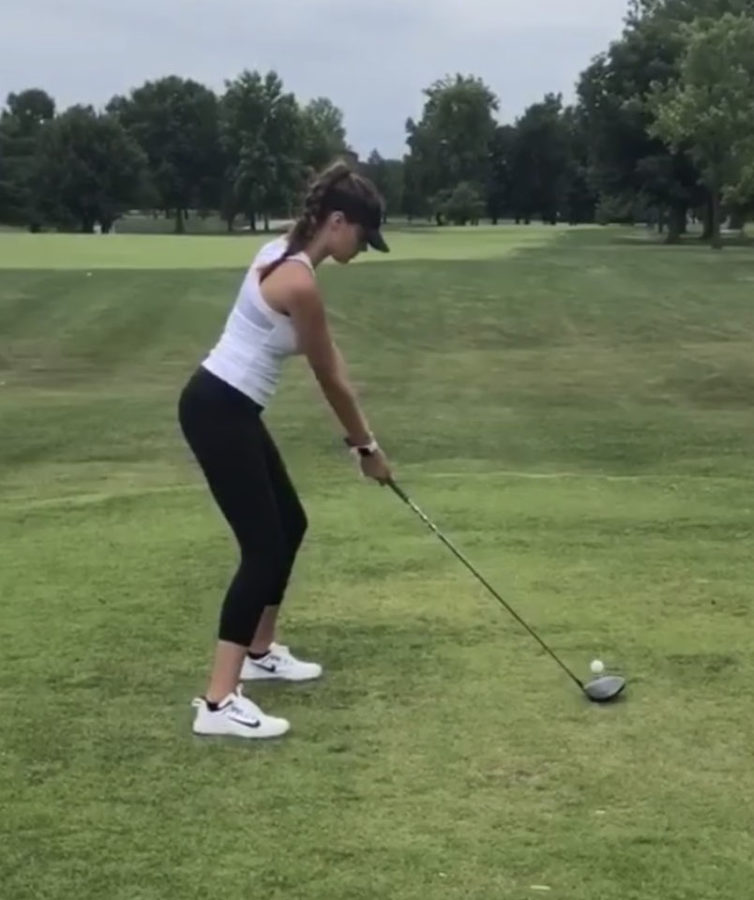 Grace Mungle prepares to drive the ball. 