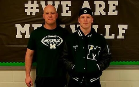 Coach Heinemann, left, and Tyler Hemmelgarn, right at Spring signing day