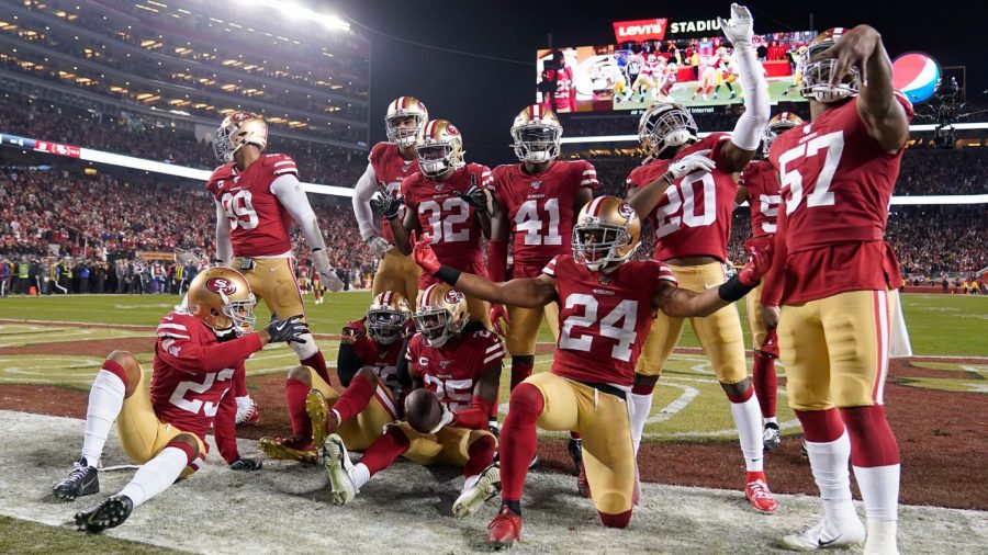 The number one seed San Francisco 49ers pose after a turnover.