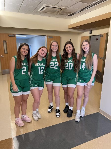 Girls basketball seniors on yearbook picture day. 