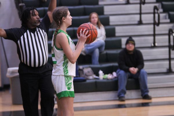 Ava Reifschneider prepares to play the ball in bounce 