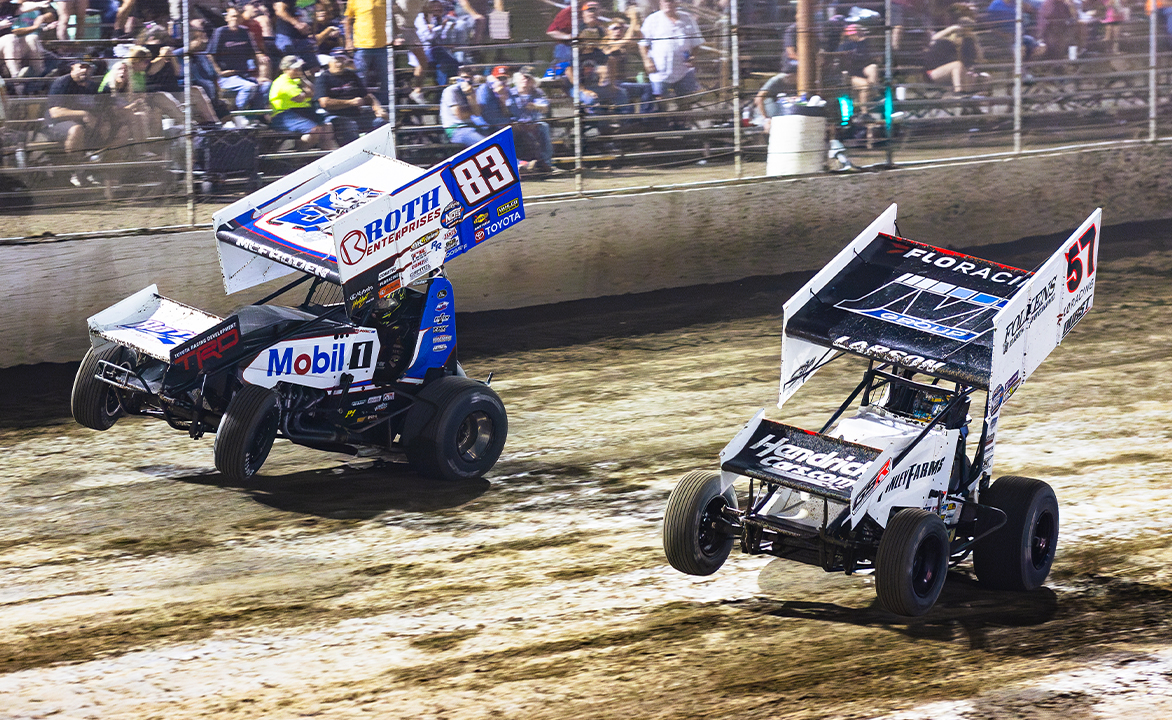 Kyle Larson and Buddy Kofoid wheelie to the finish.