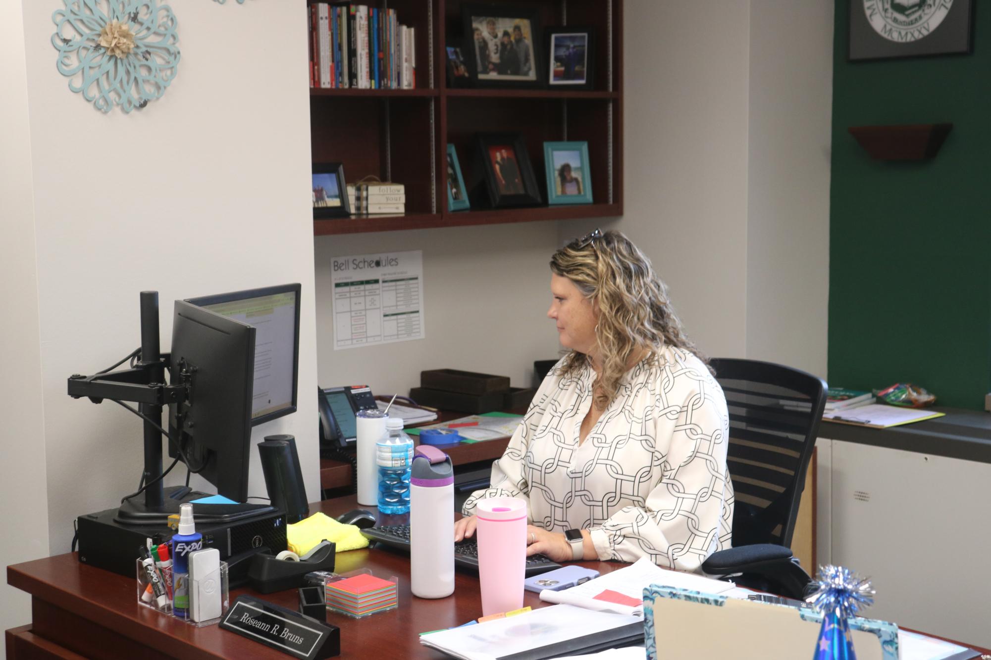 Bruns works in her office during the school day on Aug. 28.