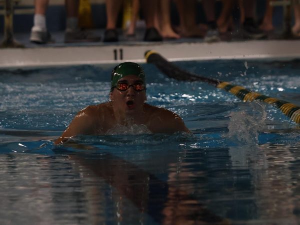 Logan Brotherton (10) competes against Oakville and Vianney.
