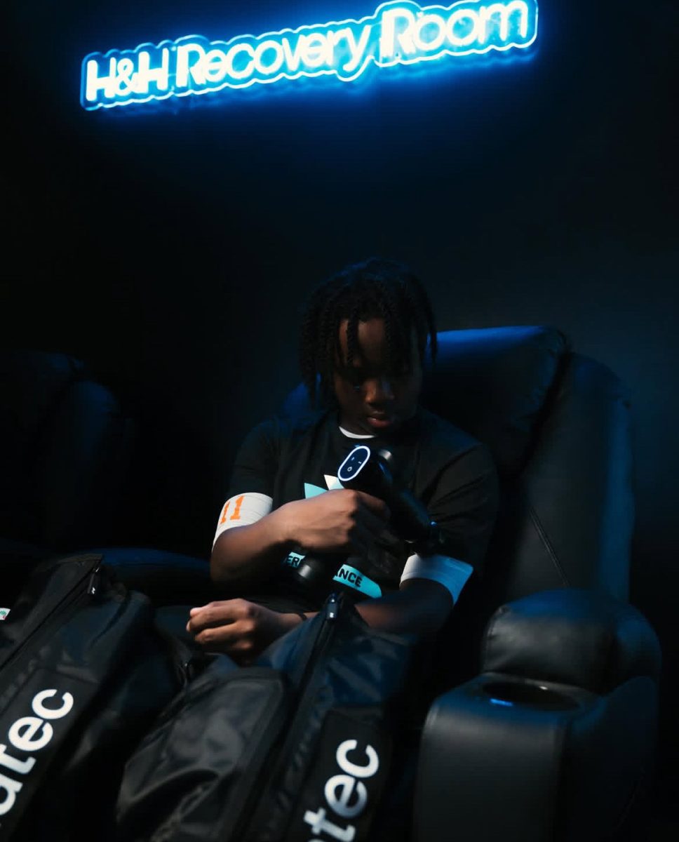 An athlete uses the Recovery Room after a workout.