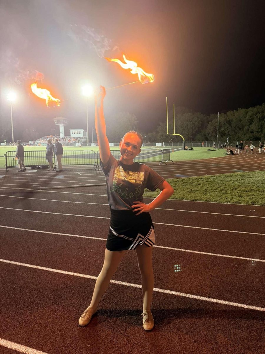 Senior Lilly Burch preforms at Mehlville homecoming game.