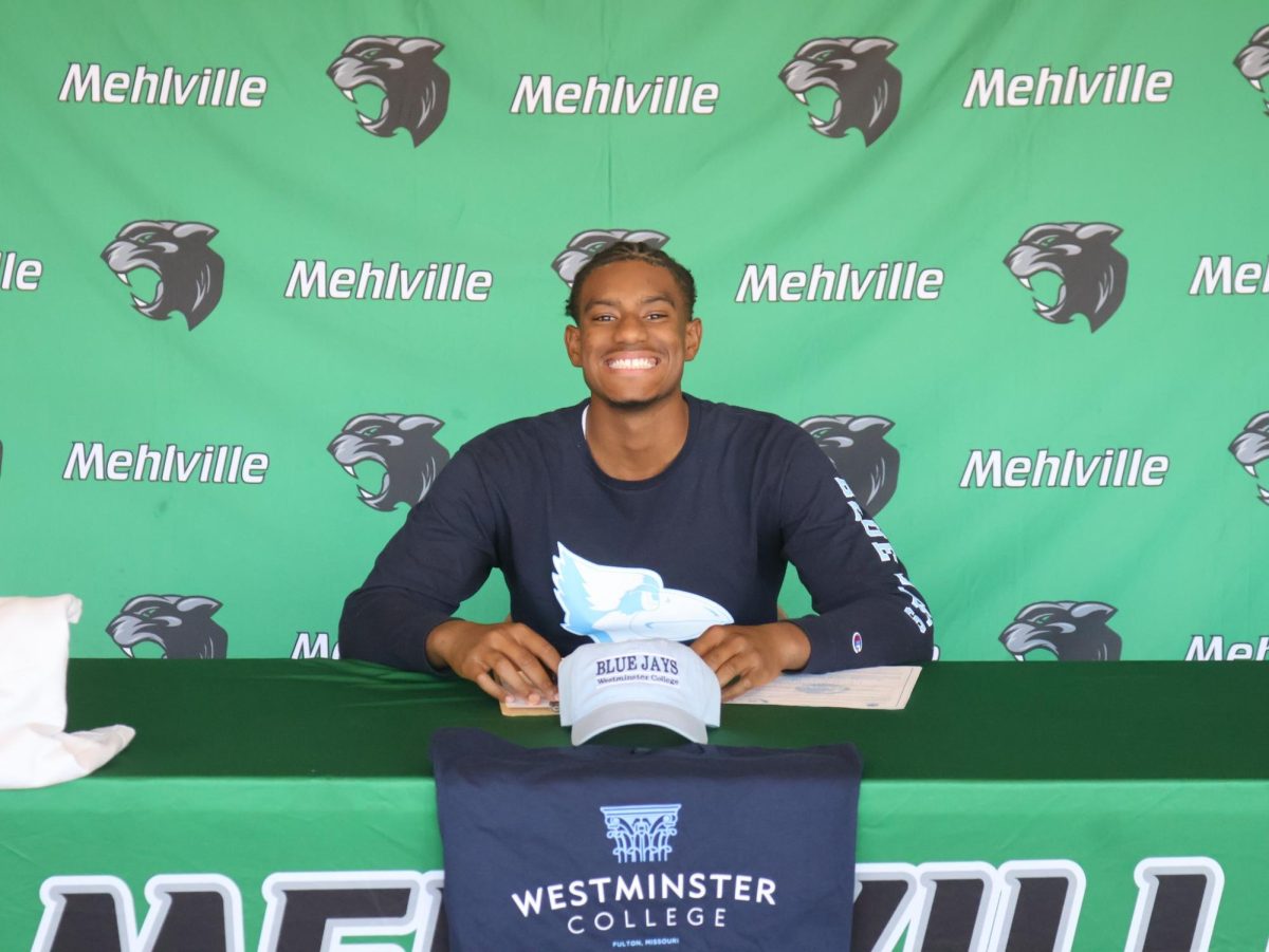 Aaron Davenport signs to play Division III football in college.