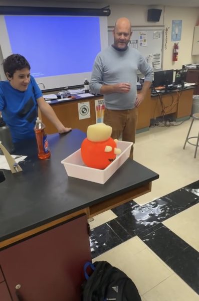 Mees showing a demonstration at the club's annual Halloween party.