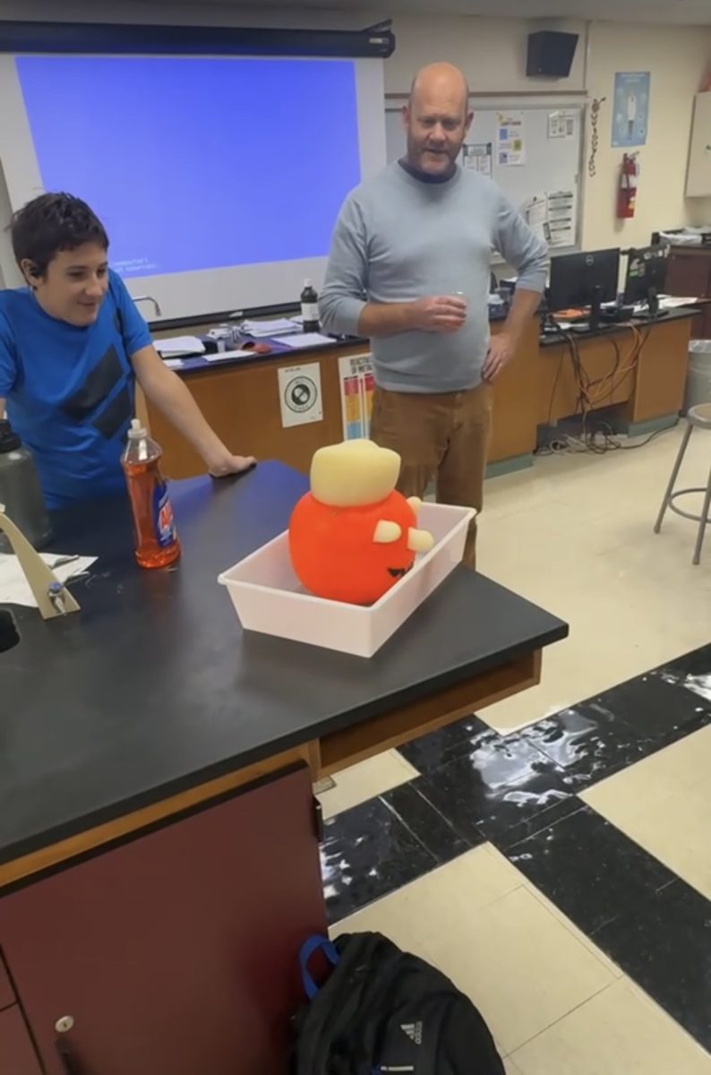 Mees showing a demonstration at the club's annual Halloween party.