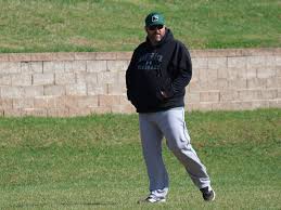 Coach Ode coaches the district rivalry game at Oakville High School.